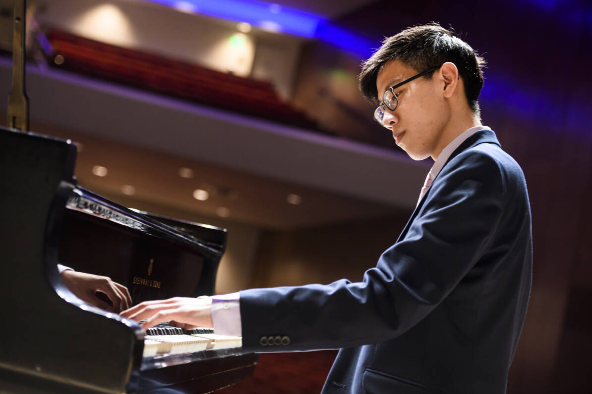 A student plays the piano